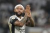 FILE - Memphis Depay from the Netherlands, playing for the Corinthians, applauds during his debut in a Brazilian soccer league match against Atletico Goianiense at the Neo Quimica Arena in Sao Paulo, Sept. 21, 2024. (AP Photo/Andre Penner, File)