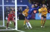 Chelsea's Lucy Bronze reacts after the ball hits the post from a shot by teammate Catarina Macario, during the English Women's Super League soccer match between Chelsea Women and Brighton and Hove Women, at Kingsmeadow, in Kingston upon Thames, England, Sunday, Dec. 8, 2024. (Steven Paston/PA via AP)