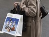 A shopper walks in downtown Montreal on December 19, 2023. THE CANADIAN PRESS/Christinne Muschi