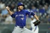 FILE - Toronto Blue Jays relief pitcher Jordan Romano throws during the ninth inning of a baseball game against the Kansas City Royals, April 22, 2024, in Kansas City, Mo. (AP Photo/Charlie Riedel, File)