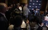 Los Angeles Dodgers manager Dave Roberts gestures after Colorado Rockies manager Bud Black, left, tried to ask him a question during a media availability at the Major League Baseball winter meetings, Monday, Dec. 9, 2024, in Dallas. (AP Photo/LM Otero)