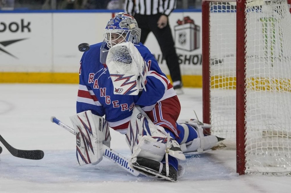 New York Rangers goaltender Igor Shesterkin reacts to a puck shot past him for a goal by Chicago Blackhawks' Tyler Bertuzzi (59) during the first period of an NHL hockey game, Monday, Dec. 9, 2024, in New York. (AP Photo/Frank Franklin II)