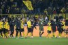 Dortmund'splayers leave the pitch after the German Bundesliga soccer match between Borussia Dortmund and Bayern Munich at the Signal-Iduna Park in Dortmund, Germany, Saturday, Nov. 30, 2024. (AP Photo/Martin Meissner)