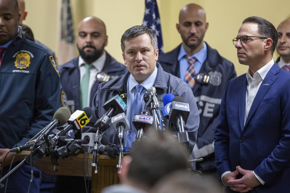 Altoona, Pa., Deputy Police Chief Derek Swope, center, speaks during a press conference regarding the arrest of suspect Luigi Mangione, Monday, Dec. 9, 2024, in Hollidaysburg, Pa., in the fatal shooting of UnitedHealthcare CEO Brian Thompson. (AP Photo/Ted Shaffrey)