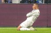 Real Madrid's Kylian Mbappe celebrates after he scored his side's first goal during the Champions League opening phase soccer match between Atalanta and Real Madrid at the Bergamo's stadium, in Bergamo, Italy, Tuesday, Dec. 10, 2024. (AP Photo/Antonio Calanni)