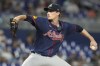 FILE - Atlanta Braves starting pitcher Max Fried aims a pitch during the third inning of a baseball game against the Miami Marlins, Saturday, Sept. 21, 2024, in Miami. (AP Photo/Marta Lavandier, File)