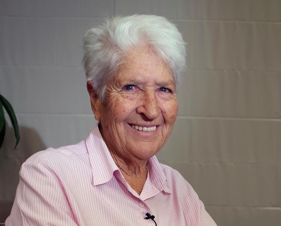 FILE - In this Oct. 9, 2014, file photo, Australian Olympic swimming great Dawn Fraser smiles during an interview in Tokyo.(AP Photo/Haruka Nuga, File)