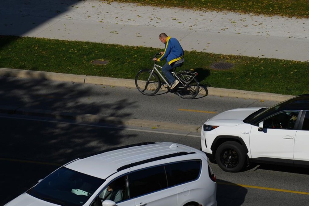Cyclists have launched a Charter challenge against the Ontario government over its decision to remove bike lanes on three Toronto roadsA cyclist uses a bike lane in Toronto on Monday, October 21, 2024.THE CANADIAN PRESS/Chris Young