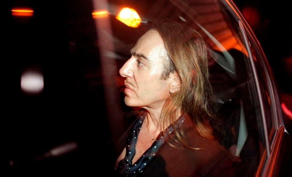 FILE - In this June 22, 2011 file photo John Galliano leaves a Paris court house, June 2011. (AP Photo/Thibault Camus, File)