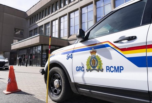 The RCMP say they've arrested a man in connection with alleged hate speech posted on social networks Telegram and X. An RCMP logo in shown on a vehicle in Montreal, Thursday, March 7, 2024. THE CANADIAN PRESS/Christinne Muschi
