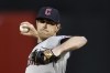 FILE - Cleveland Guardians pitcher Shane Bieber throws to an Oakland Athletics batter during the first inning of a baseball game Thursday, March 28, 2024, in Oakland, Calif. (AP Photo/Godofredo A. Vásquez, File)