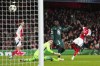 Arsenal's Bukayo Saka, right, scores his side's second goal during the Champions League opening phase soccer match between Arsenal and Monaco, at the Emirates Stadium in London, Wednesday , Dec.11, 2024. (AP Photo/Dave Shopland)