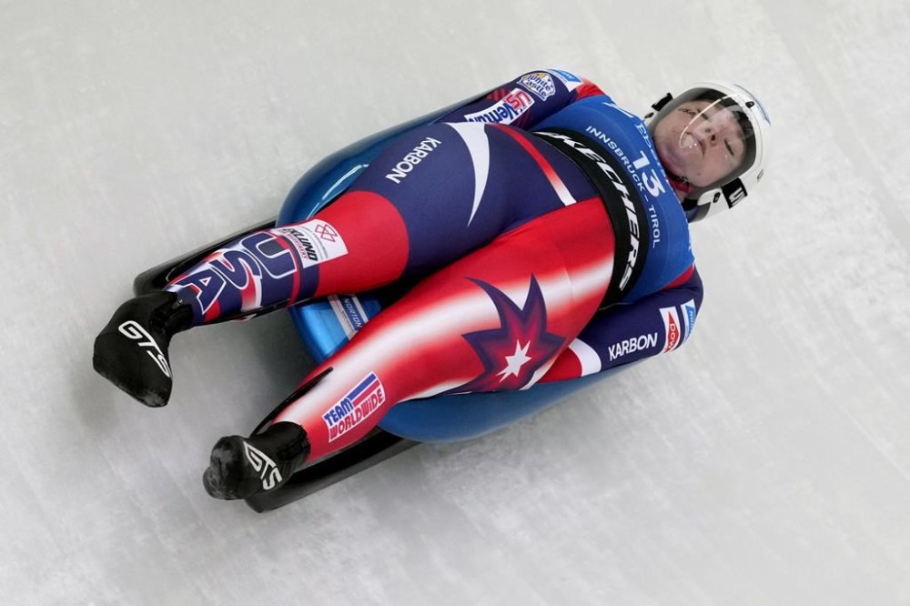 Ashley Farquharson of the United States competes during the women's sprint race at the Luge World Cup in Igls near Innsbruck, Austria, Saturday, Dec. 7, 2024. (AP Photo/Matthias Schrader)