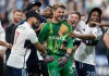 Vancouver Whitecaps goalkeeper Isaac Boehmer, centre, celebrates with Ryan Raposo, left, Ryan Gauld, second right, and Levonte Johnson, right, after Vancouver defeated Toronto FC on penalty kicks during the Canadian Championship final soccer match, in Vancouver, on Wednesday, Sept. 25, 2024. THE CANADIAN PRESS/Darryl Dyck