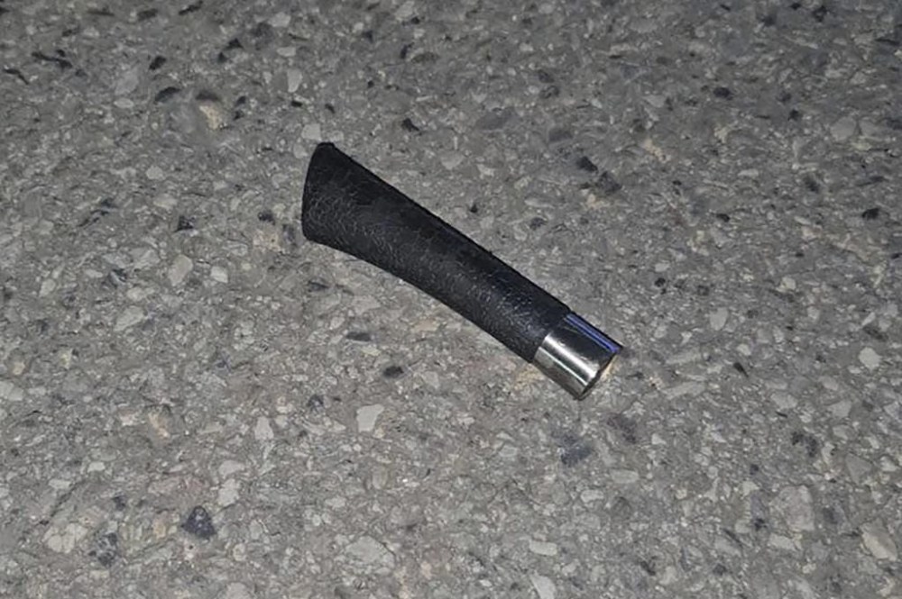 This photo provided by the Sawang Rojana Thammasathan Sattahip Rescue shows a knife handle found at the crime scene where a Thai-Australian boy was stabbed to death in Sattahip, Chonburi province, Thailand, Tuesday, Dec. 10, 2024. (Sawang Rojana Thammasathan Sattahip Rescue via AP)