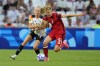 The Canadian women will finish 2024 unchanged at No. 6 in the FIFA rankings looking to put the drone-spying scandal at the Paris Olympics finally behind them. Germany's Laura Freigang fights for the ball with Canada's Quinn during a women's quarterfinal soccer match between Canada and Germany at the 2024 Summer Olympics, Saturday, Aug. 3, 2024, at Marseille Stadium in Marseille, France. THE CANADIAN PRESS/AP/Julio Cortez