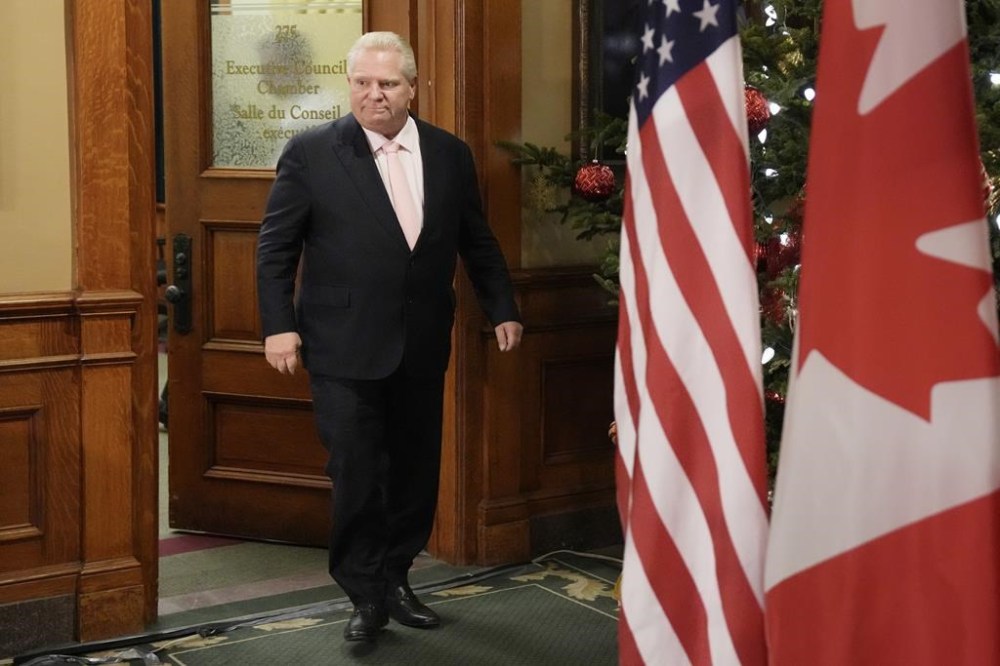 Canada's premiers are meeting in Toronto today, and cross-border trade is topping the agenda, on the heels of a tariff threat from U.S. president-elect Donald Trump. Ontario Premier Doug Ford steps out of an office to speak to the media at the Ontario Legislature in Toronto on Wednesday December 11, 2024. THE CANADIAN PRESS/Chris Young