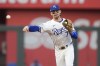 FILE - Kansas City Royals shortstop Bobby Witt Jr. throws out New York Yankees' Gleyber Torres at first during the first inning in Game 3 of an American League Division baseball playoff series, Oct. 9, 2024, in Kansas City, Mo. (AP Photo/Charlie Riedel, File)