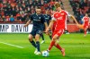 Ivan Ordets from VfL Bochum, left, and Berlin's Tom Rothe in action during the Bundesliga soccer match between FC Union Berlin and VfL Bochum in Berlin, Saturday Dec. 14, 2024. (Andreas Gora/dpa via AP)