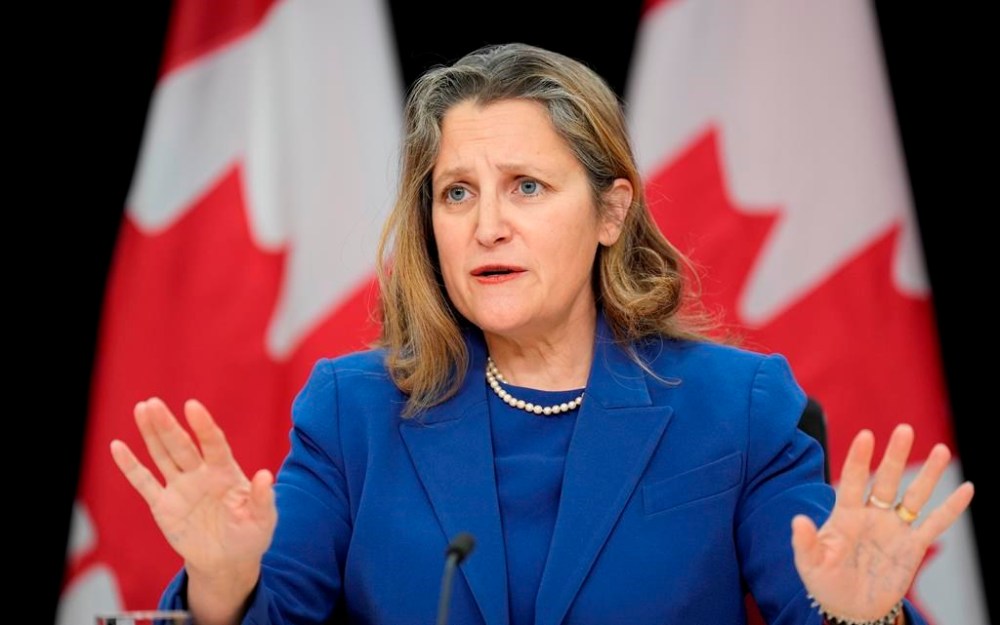 Finance Minister Chrystia Freeland speaks with reporters in Ottawa, Tuesday, Dec. 10, 2024. THE CANADIAN PRESS/Adrian Wyld