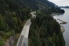 British Columbia Sea to Sky Highway near Lions Bay has been closed in both directions after a landslide brought down trees and debris. Motorists travel on the Sea-to-Sky highway between Horseshoe Bay and Lions Bay, B.C., on Friday, April 23, 2021. THE CANADIAN PRESS/Darryl Dyck