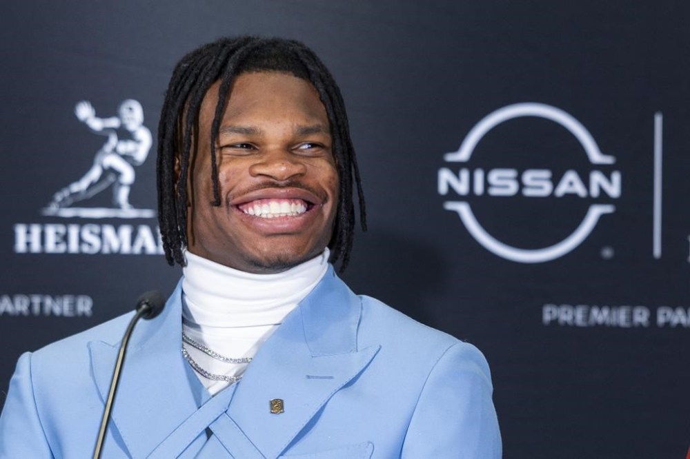 Heisman Trophy finalist Travis Hunter, of Colorado, speak at a college football press conference, Saturday, Dec. 14, 2024, in New York. (AP Photo/Corey Sipkin)
