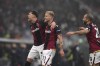 Bologna's Jens Odgaard celebrates after scoring his side's first goal during the Serie A soccer match between Bologna and Fiorentina, at Renato Dall'Ara Stadium in Bologna, Italy, Sunday Dec. 15, 2024. (Massimo Paolone/LaPresse via AP)