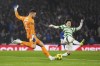 Rangers goalkeeper Jack Butland, left, and Celtic's Kyogo Furuhashi in action during the Premier Sports Cup Final at Hampden Park, Glasgow, Scotland, Sunday Dec. 15, 2024. (Andrew Milligan/PA via AP)
