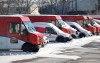 Canada Post vehicles sit covered in snow at a distribution facility after a strike that has lasted more than four weeks, in Ottawa on December 13, 2024. THE CANADIAN PRESS/ Patrick Doyle