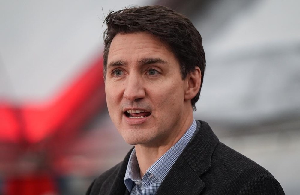 Prime Minister Justin Trudeau speaks during a launch and naming ceremony for the new Royal Canadian Navy Joint Support vessel HMCS Protecteur at Seaspan Shipyards in North Vancouver, B.C. on Friday December 13, 2024. THE CANADIAN PRESS/Darryl Dyck