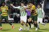 Marshall's Lineker Rodrigues dos Santos, center, and Vermont's Zach Barrett, second from right, battle for a ball during the first half of the NCAA College Cup National Championship soccer final in Cary, N.C., Monday, Dec. 16, 2024. (AP Photo/Ben McKeown)