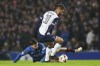 Tottenham's Rodrigo Bentancur takes the ball from Rangers' Robin Proepper during the Europa League opening phase soccer match between Glasgow Rangers and Tottenham Hotspur at Ibrox stadium in Glasgow, Thursday, Dec. 12, 2024. (AP Photo/Scott Heppell)