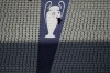 FILE - A security official walks past a Champions League trophy logo during an Inter Milan training session at the Ataturk Olympic Stadium in Istanbul, Turkey, Friday, June 9, 2023. (AP Photo/Thanassis Stavrakis, File)