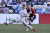 New York Red Bulls midfielder Cameron Harper (17) shoots past Los Angeles Galaxy defender John Nelson (14) during the second half of the MLS Cup championship soccer match Saturday, Dec. 7, 2024, in Carson, Calif. (AP Photo/Etienne Laurent)