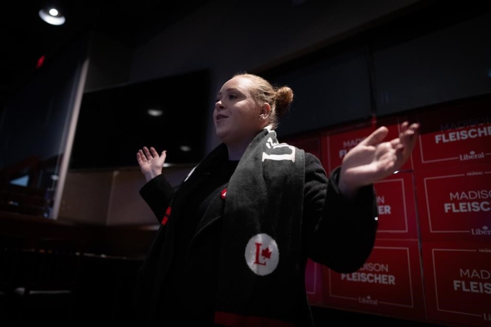 Cloverdale Langley City Liberal party candidate Madison Fleischer speaks to volunteers at an event following a federal byelection in Surrey B.C., on Monday, Dec. 16, 2024. THE CANADIAN PRESS/Ethan Cairns