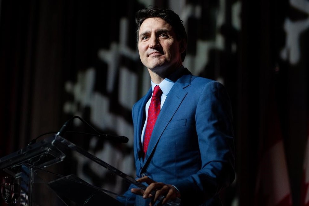 Prime Minister Justin Trudeau delivers remarks during a National Caucus holiday event in Ottawa, on Tuesday, Dec. 17, 2024. THE CANADIAN PRESS/Spencer Colby