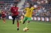 Jamaica's Kevon Lambert (3) and Trinidad & Tobago's Andre Rampersad (17) chase after a loose ball during the second half of a CONCACAF Gold Cup soccer match Wednesday, June 28, 2023, in St. Louis. THE CANADIAN PRESS/AP/Jeff Roberson