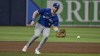 FILE - Toronto Blue Jays first baseman Spencer Horwitz reaches for an infield grounder during a baseball game against the Tampa Bay Rays Saturday, Sept. 21, 2024, in St. Petersburg, Fla. (AP Photo/Steve Nesius, File)