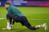 PSG's goalkeeper Gianluigi Donnarumma warms-up prior to a Champions League opening phase soccer match against FC Salzburg in Salzburg, Austria, Tuesday, Dec. 10, 2024.(AP Photo/Matthias Schrader)