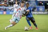 CF Montreal's Jahkeele Marshall-Rutty, right, challenges Chicago Fire's Brian Gutierrez during MLS soccer action in Montreal, Saturday, September 21, 2024. THE CANADIAN PRESS/Graham Hughes