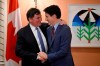 Prime Minister Justin Trudeau congratulates Dominic LeBlanc after he was sworn in as Finance Minister at a swearing in ceremony at Rideau Hall, in Ottawa, Monday, Dec. 16, 2024. THE CANADIAN PRESS/Justin Tang