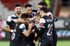 Lugano's Mattia Bottani, center right, celebrates scoring with teammates Mattia Zanotti, left, and Milton Valenzuela, right, during the Conference League opening phase soccer match between FC Lugano and Pafos FC at the Stockhorn Arena, in Thun, Switzerland, Thursday, Dec. 19, 2024. (Anthony Anex/Keystone via AP)