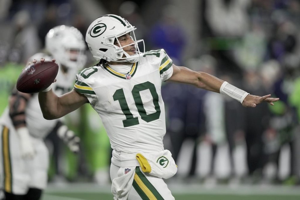 Green Bay Packers' Jordan Love throws during the second half of an NFL football game against the Seattle Seahawks Sunday, Dec. 15, 2024, in Seattle. (AP Photo/Stephen Brashear)