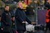 Barcelona's head coach Hansi Flick reacts during the Champions League opening phase soccer match between Borussia Dortmund and FC Barcelona at the Signal-Iduna Park in Dortmund, Germany, Wednesday Dec. 11, 2024. (AP Photo/Martin Meissner)