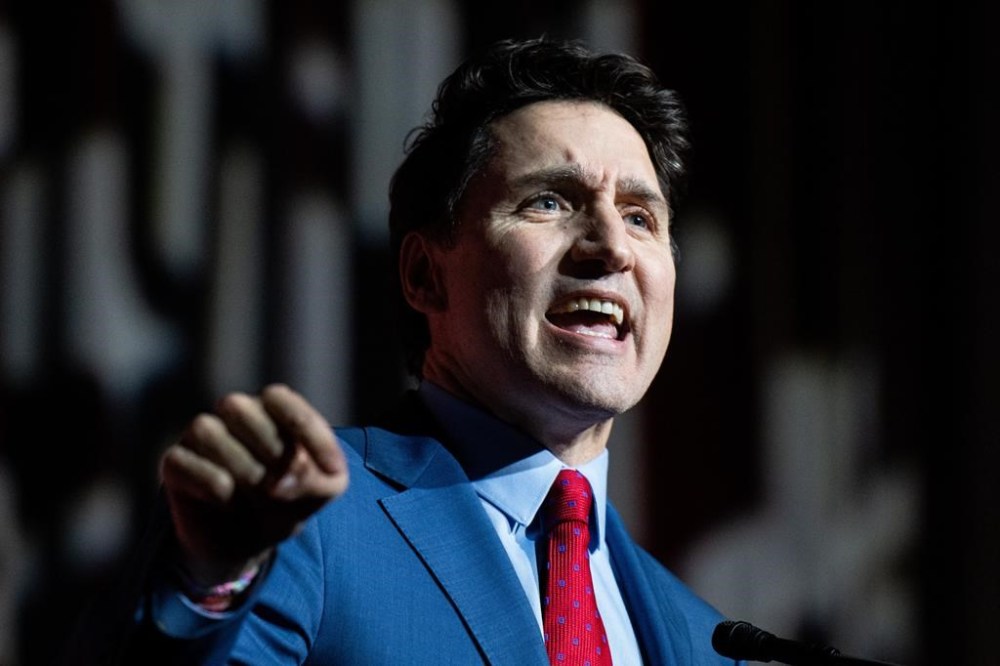 Prime Minister Justin Trudeau delivers remarks during a National Caucus holiday event in Ottawa, on Tuesday, Dec. 17, 2024. THE CANADIAN PRESS/Spencer Colby