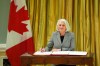 Minister of Seniors Joanne Thompson signs a document during a cabinet swearing-in ceremony at Rideau Hall in Ottawa, on Friday, Dec.20, 2024. THE CANADIAN PRESS/Sean Kilpatrick
