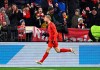 Munich's Konrad Laimer celebrates scoring during the Bundesliga soccer match between Bayern Munich and RB Leipzig at the Allianz Arena, Munich, Germany, Friday Dec. 20, 2024. (Tom Weller/dpa via AP)