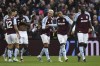 Aston Villa's Morgan Rogers, center, celebrates with teammates after scoring his side's second goal during the English Premier League soccer match between Aston Villa and Manchester City, at Villa Park in Birmingham, England, Saturday, Dec. 21, 2024. (AP Photo/Rui Vieira)