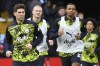 Manchester City's John Stones, left, runs during the warm up before the English Premier League soccer match between Aston Villa and Manchester City, at Villa Park in Birmingham, England, Saturday, Dec. 21, 2024. (AP Photo/Rui Vieira)
