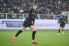 Genoa's Andrea Pinamonti celebrates scoring during the Serie A soccer match between Genoa and Napoli at the Luigi Ferraris Stadium in Genoa, Italy, Saturday Dec. 21, 2024. (Tano Pecoraro/LaPresse via AP)